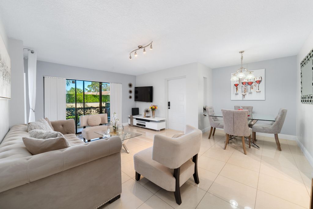 Photo of 702 Sunny Pine Way #Unit B1, Greenacres, FL 33415 (MLS # B26000705)