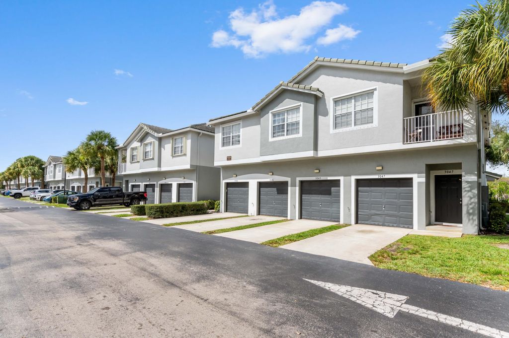Photo of 3043 Grandiflora Drive, Greenacres, FL 33467 (MLS # B26022874)