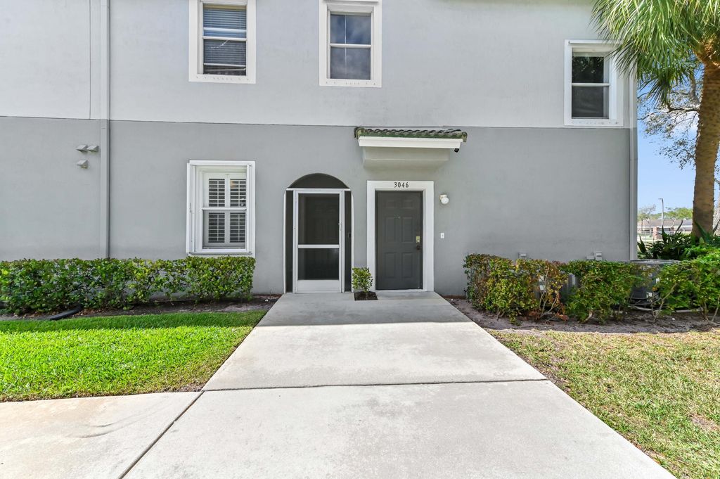 Photo of 3043 Grandiflora Drive, Greenacres, FL 33467 (MLS # B26022874)