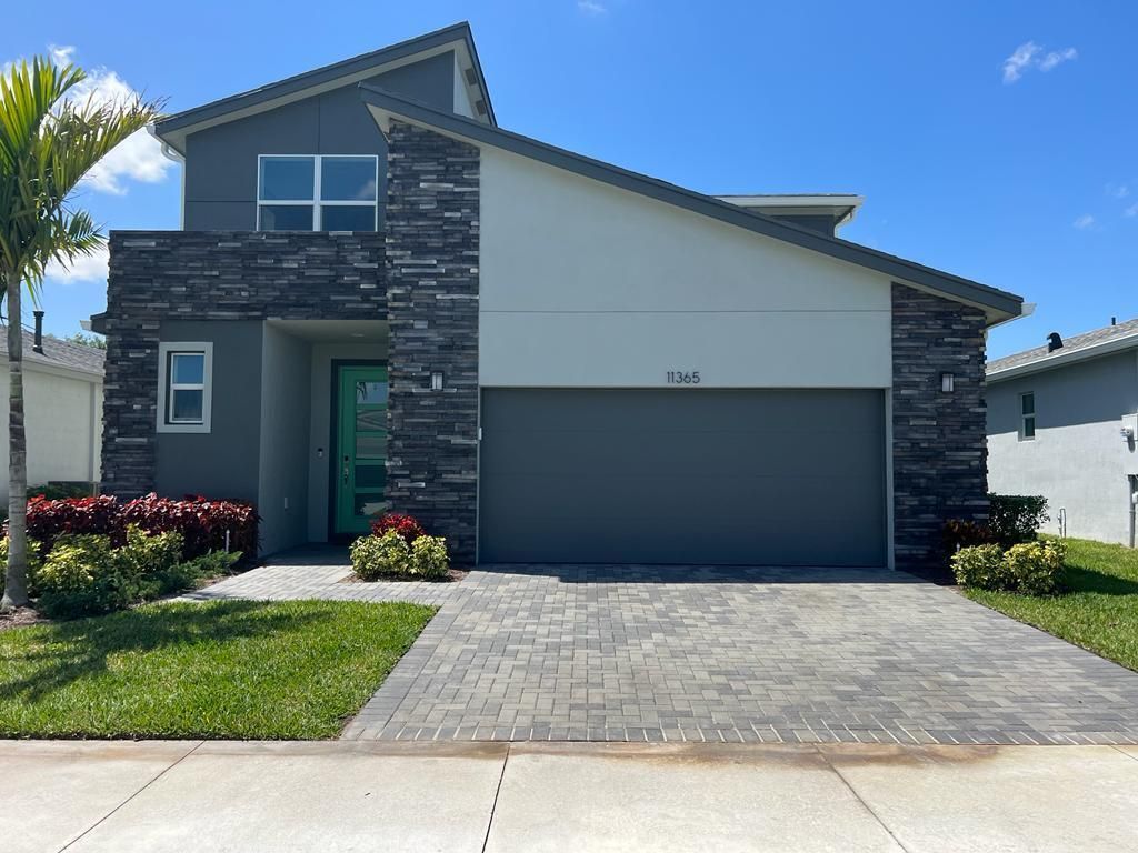 Photo of 11365 SW Lyra Drive, Port Saint Lucie, FL 34987 (MLS # B26031296)