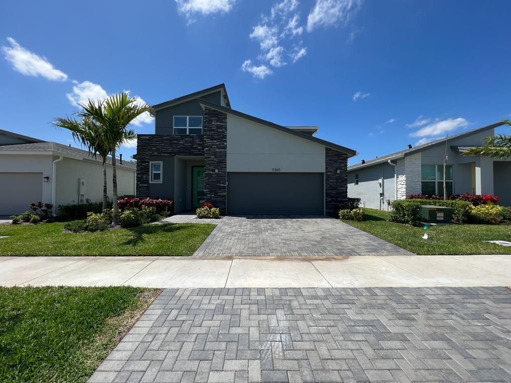 Photo of 11365 SW Lyra Drive, Port Saint Lucie, FL 34987 (MLS # B26031296)