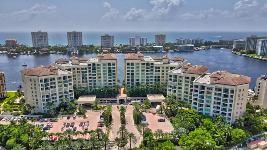 When the details really matter and only the best will do, you will know you arrived at this luxurious Mizner Grand home. Renovated from floor to ceiling no detail was spared. Arrive at your private vestibule to a beautiful marble entry. The expansive condominium has Italian wood floors throughout the main areas and bedrooms. The very large open concept kitchen and living area contains ample seating for visits with family and friends. A fully equipped bar contains an ice maker and dishwasher for bar glasses  as well as a full size wine refrigerator. Mother of pearl appears in the kitchen backsplash as well as on the floor and walls of the guest powder room. The master suite is a dream with his and her baths and a large custom walk in closet. This is a must see hom