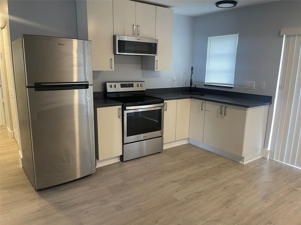 Photo of 780 NE 46th Court #2, Oakland Park, FL 33334 (MLS # F10494219)