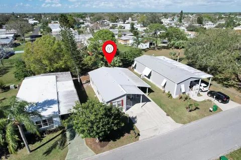 329 Egret Circle, Barefoot Bay, FL MLS: R11063870