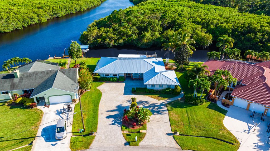 Photo of 898 SE Seahouse Drive, Port Saint Lucie, FL 34983 (MLS # R10918181)