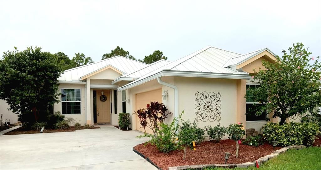 Photo of 9407 Poinciana Court, Fort Pierce, FL 34951 (MLS # R10881398)