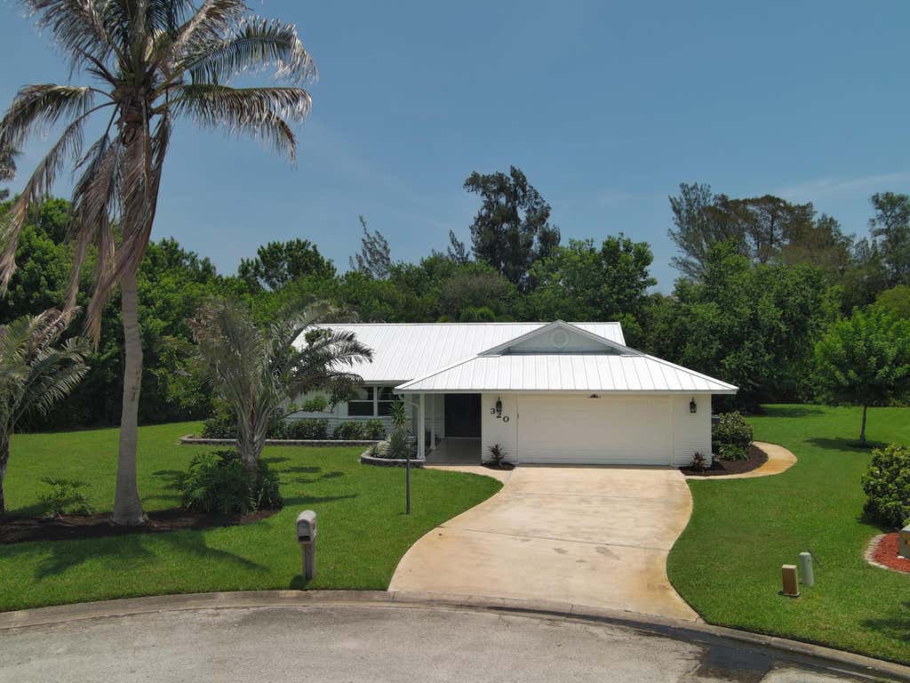 Photo of 320 W FOREST Trail, Vero Beach, FL 32962 (MLS # B26055434)