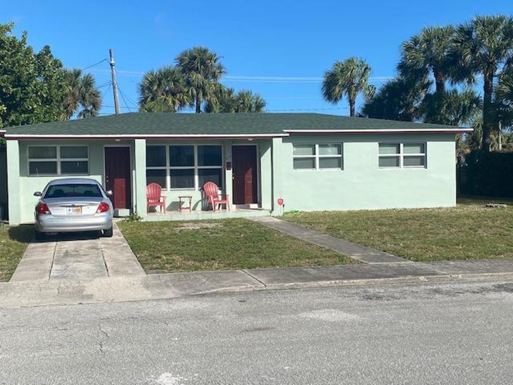 Photo of 617 Foresteria Drive, Lake Park, FL 33403 (MLS # R10681311)