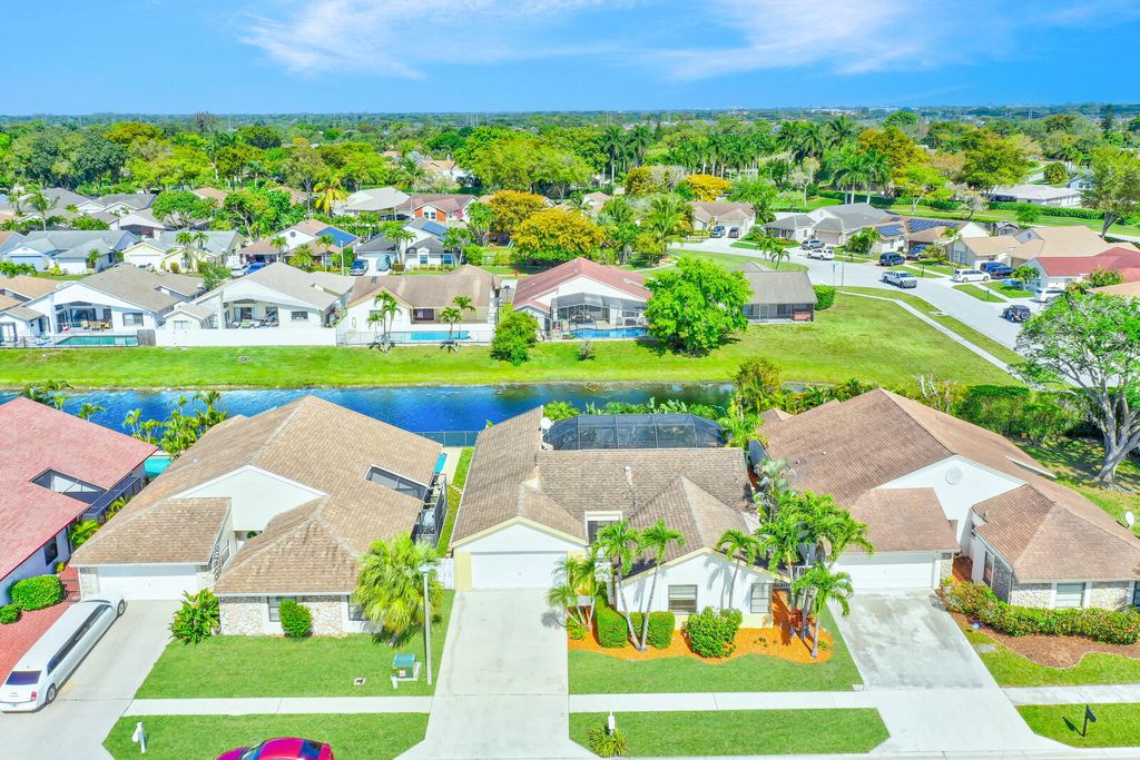 Photo of 21118 Rustlewood Avenue, Boca Raton, FL 33428 (MLS # R10969558)