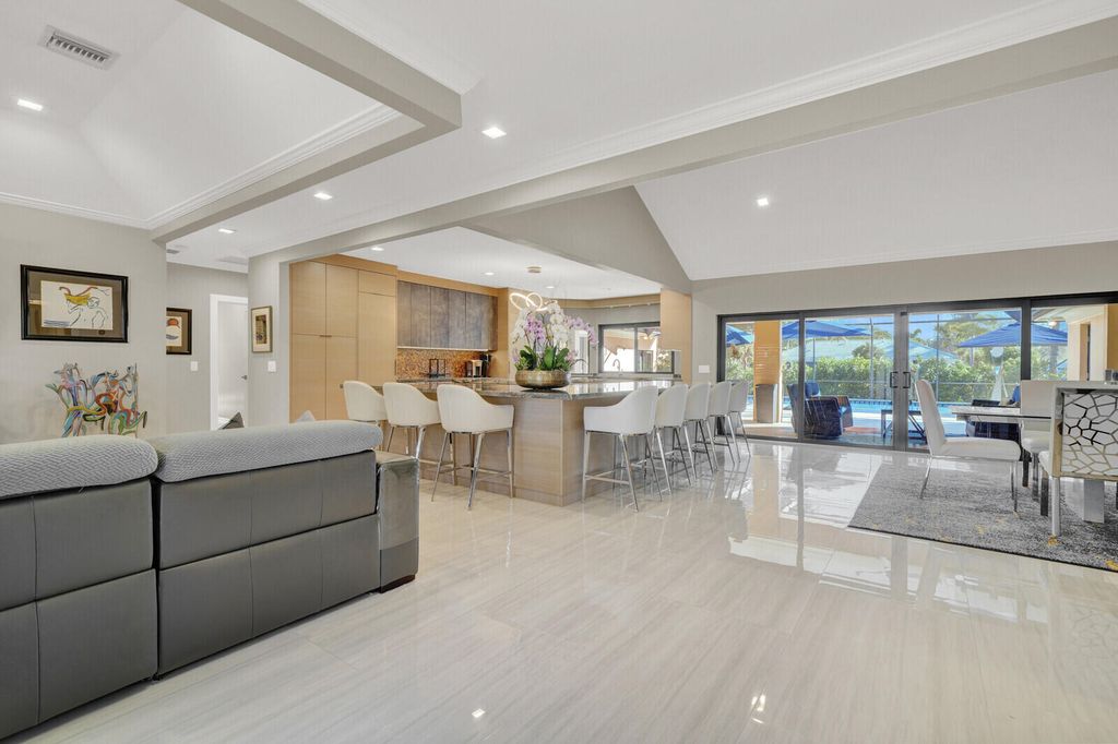 Photo of 513 N Country Club Drive, Atlantis, FL 33462 (MLS # R11163008)