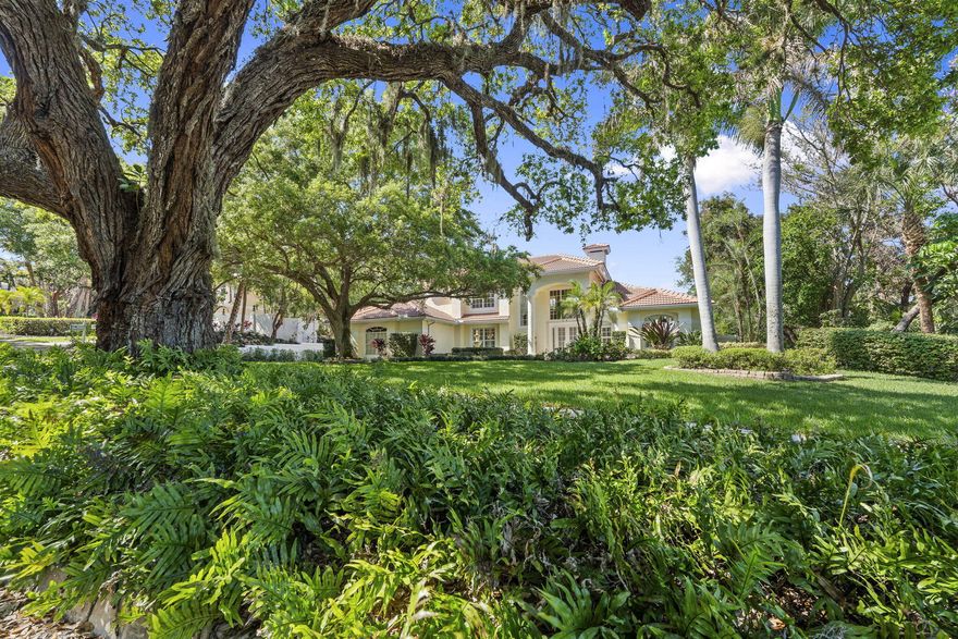 This beautifully appointed 4 bedroom, 3 bathroom home—with optional 5th bedroom—offers a sophisticated yet comfortable lifestyle. Light-filled interiors showcase volume ceilings, marble countertops, and plantation shutters. Several features include a 2025 barrel tile roof, impact windows, instant hot water heater and a 250 gallon propane tank installed in 2025, enhance both style and function. Outdoors, a private setting surrounds the heated pool & spa with an extended deck and newer pool pump & controller, perfect for effortless entertaining all while being ideally located near shopping and the beach.