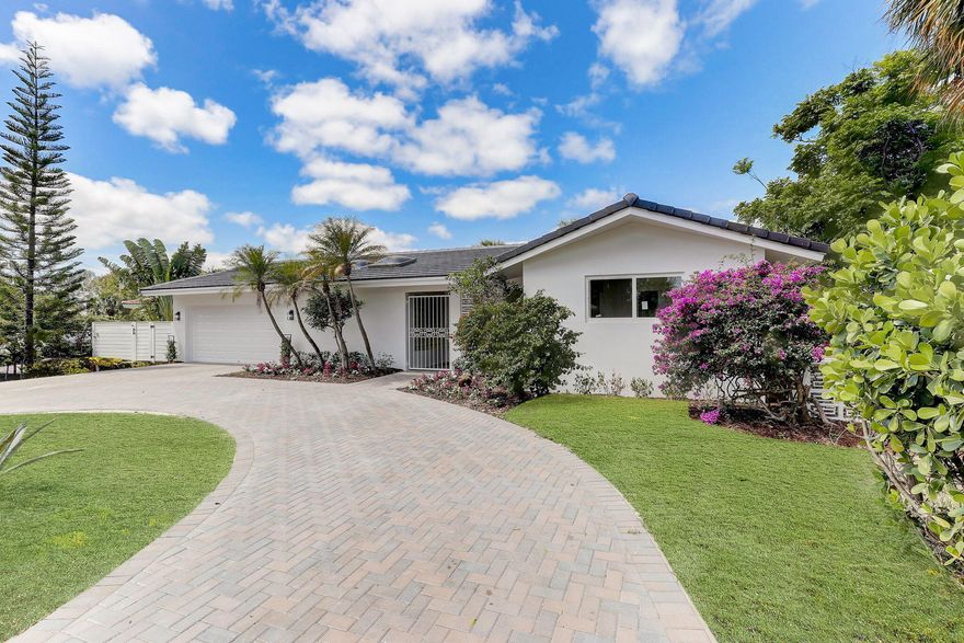 A modern remodeled waterfront oasis in the heart of Fort Lauderdale. This stunning home offers 3 bedrooms, 2 bathrooms, plus a den and 2349 square feet of living space, all thoughtfully designed for contemporary living. Situated on an oversized corner lot spanning 11,409 square feet, with 30 feet of intracoastal water frontage, this property boasts a private dock, perfect for enjoying the breathtaking waterfront views. Some of the wonderful features include a 2023 flat tile roof and impact windows and doors throughout. Whether you're relaxing in the spacious interior or entertaining on the private dock, this home offers the perfect blend of luxury and tranquility. Don't miss the opportunity to make this waterfront retreat your own.
