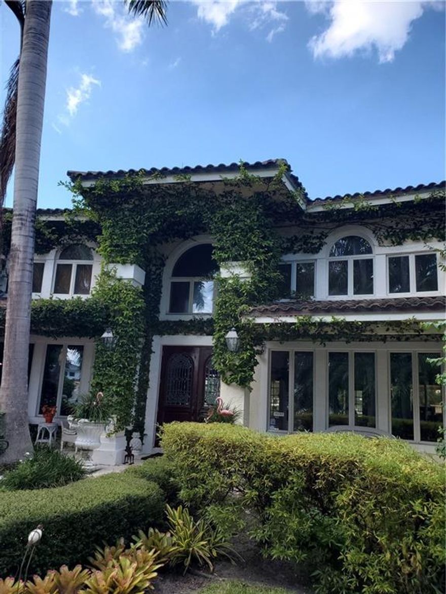 This rare point lot on Nurmi Isles has 295' water frontage, 145' faces north on a 300' wide canal and 150' faces west on a 120' wide canal. The house needs a major remodel or can be removed for new constructiom. The street has underground utilities and natural gas is available.