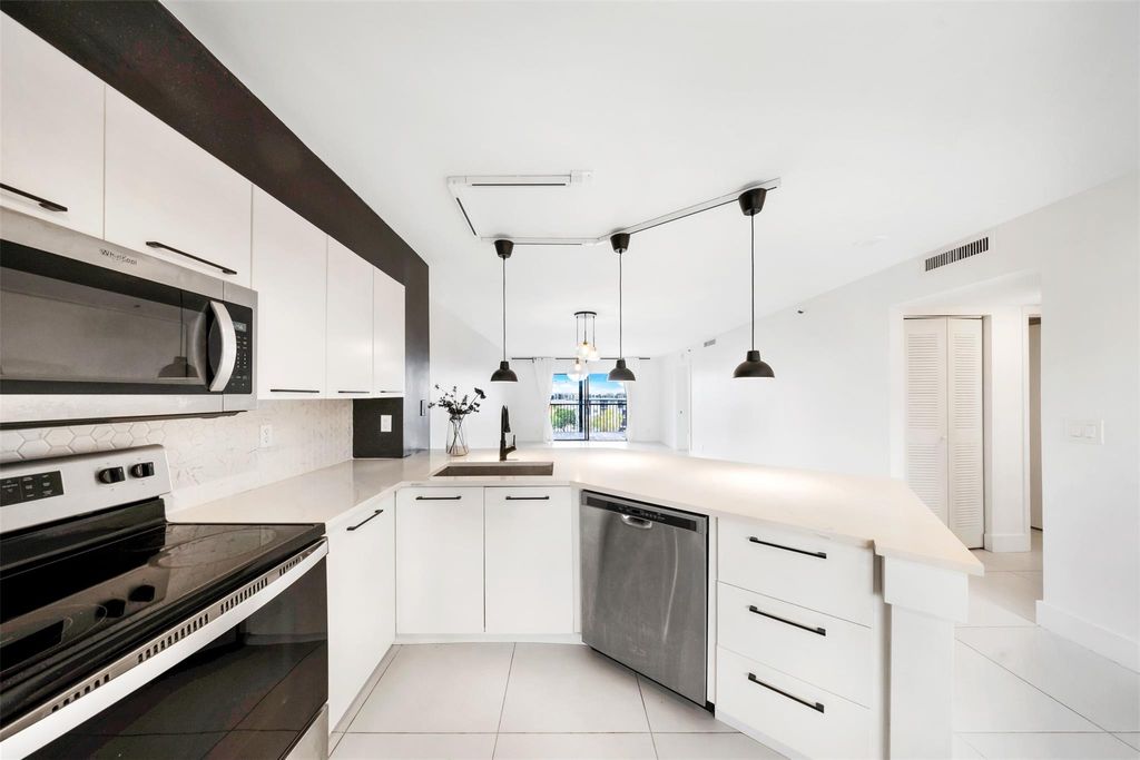 Photo of 2217 Cypress Island Drive #602, Pompano Beach, FL 33069 (MLS # F10431080)