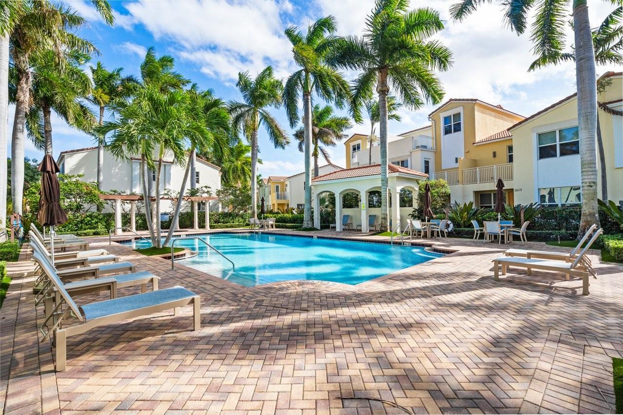 Step into the dream! This gorgeous property truly exemplifies the perfect blend of luxury, location, and lifestyle! Discover the charm of this amazing home, located in the highly sought-after, manicured Centra community of Boca Raton. The gourmet kitchen is a chef's delight complete with a center island, rich cabinetry, and granite counters. Time to make culinary masterpieces! This exquisite townhome features a private elevator, stunning natural preserve views, proximity to top-rated public schools, and a sleek, light-filled interior with premium finishes. Enjoy seamless access to world-class shopping, dining, and beaches, all while taking advantage of Centra's exceptional amenities, including a pool, fitness center, and scenic walking trails. Come lose yourself in the luxury of Centra!