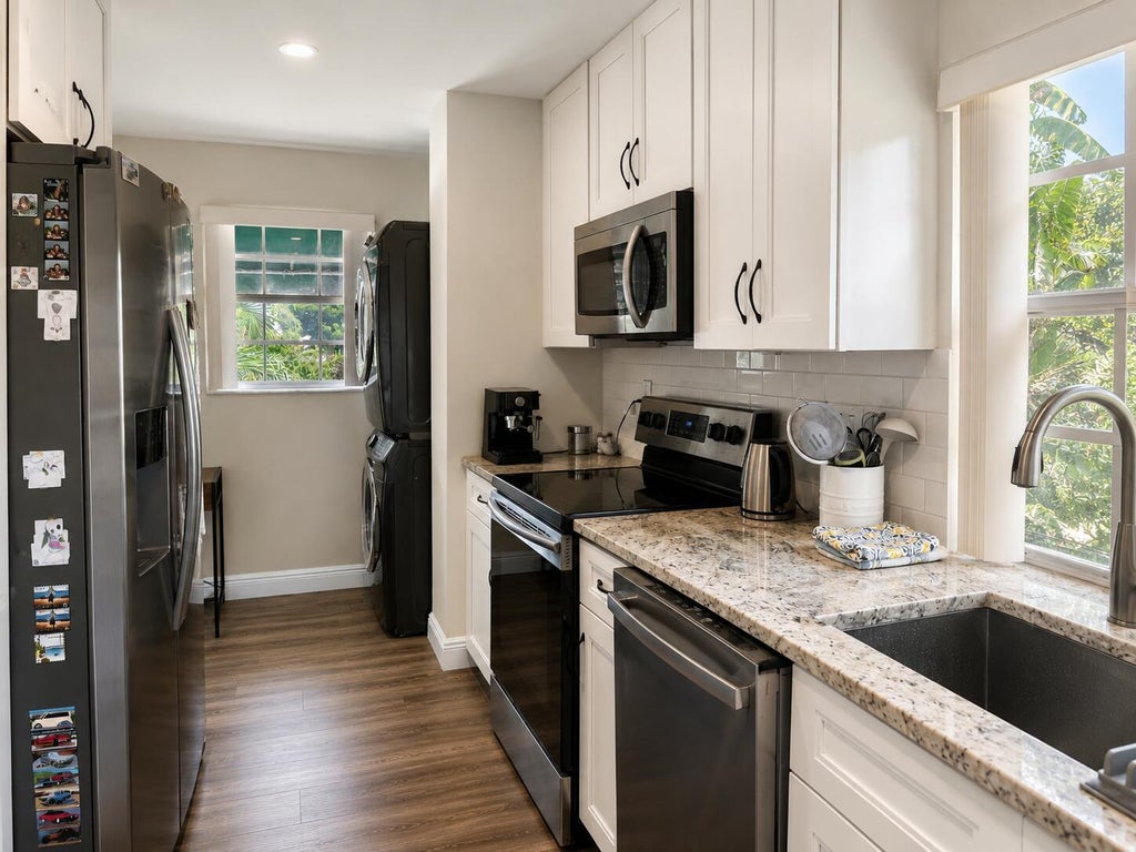 Photo of 6560 VIA REGINA, Boca Raton, FL 33433 (MLS # B26068556)