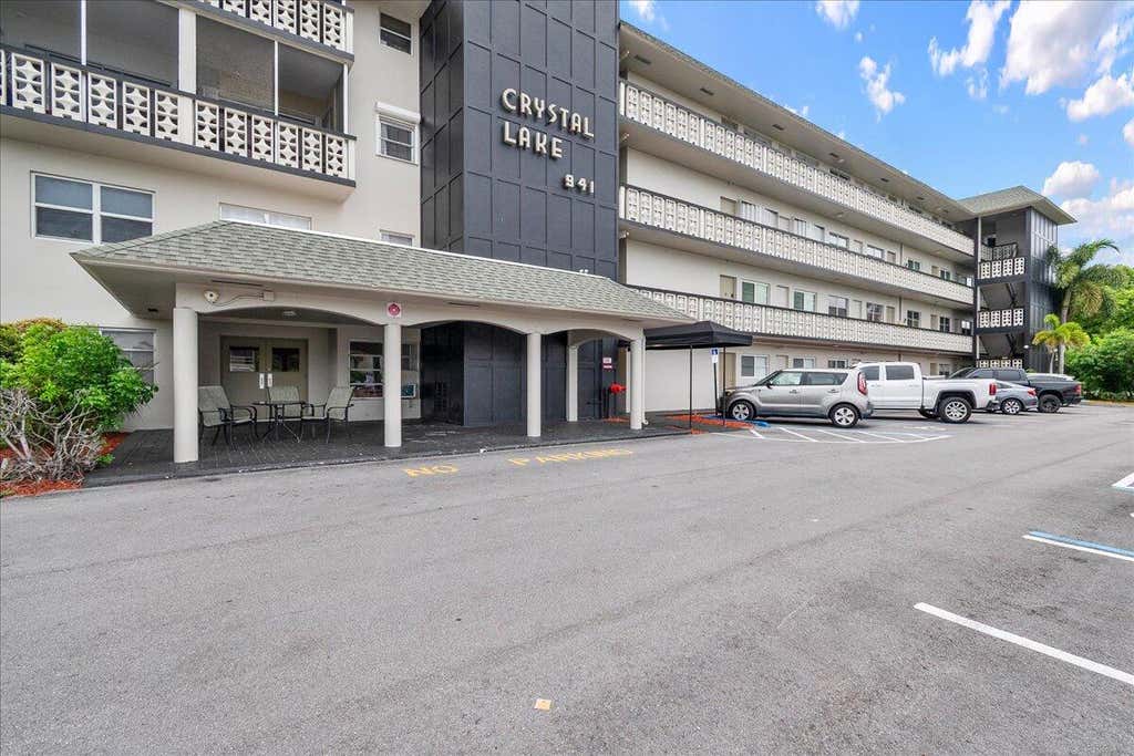 Photo of 941 Crystal Lake Drive #402, Deerfield Beach, FL 33064 (MLS # B26040734)