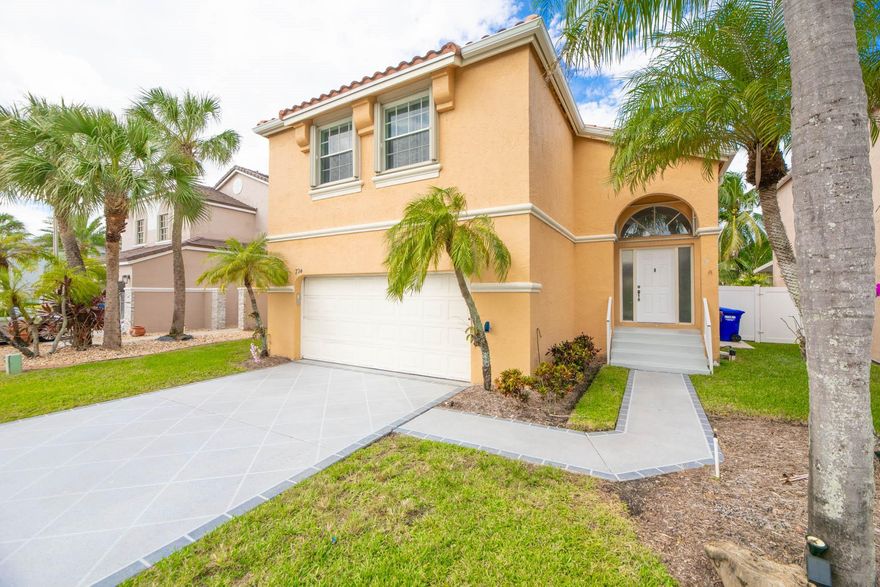 Beautifully updated 4 bedroom, 2.5 bath home in the heart of Pembroke Pines! This spacious two story property has been freshly painted and features a bright open layout, large living and dining spaces, and an upgraded kitchen with newer appliances. All bedrooms are generously sized, with the primary suite offering a walk in closet and private bath. Step outside to a newly installed pergola that is perfect for outdoor dining or relaxing in your private backyard. The home also includes a new AC unit, indoor laundry, and plenty of storage. Located on a quiet street just minutes from shops, dining, schools, and major highways. Well maintained, move in ready, and easy to show!