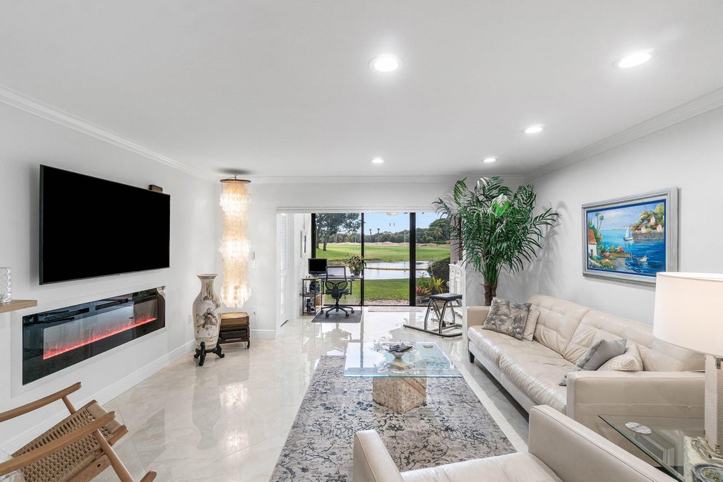 Photo of 34 STRATFORD Lane W #C, Boynton Beach, FL 33436 (MLS # B26069473)