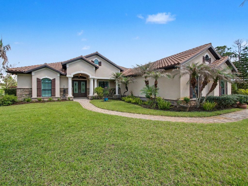 Photo of 774 SW Winston Avenue, Palm City, FL 34990 (MLS # B26022897)