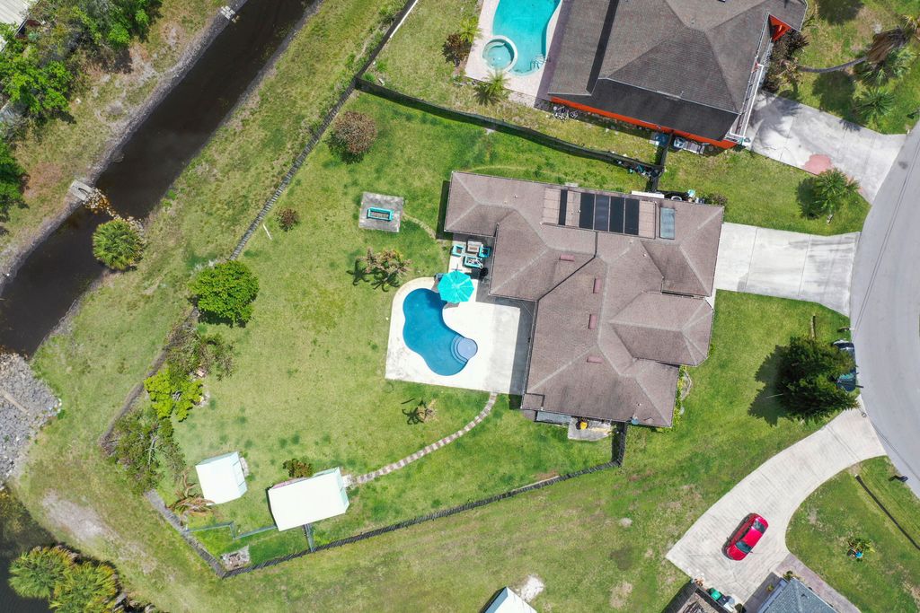 Photo of 2646 SW Acco Road, Port Saint Lucie, FL 34953 (MLS # B26015085)