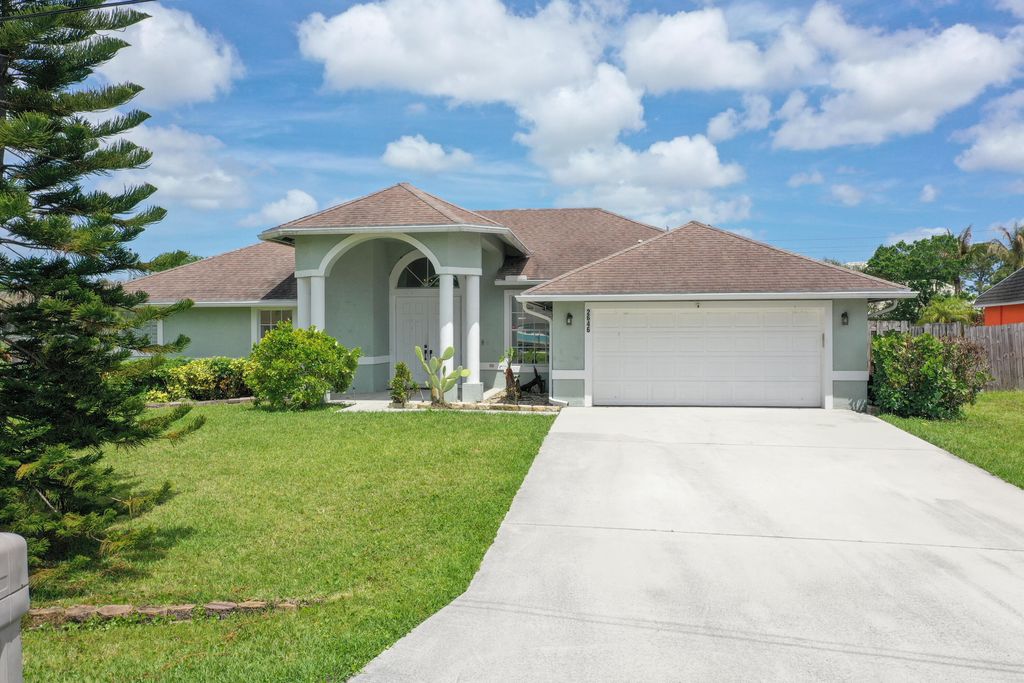 Photo of 2646 SW Acco Road, Port Saint Lucie, FL 34953 (MLS # B26015085)