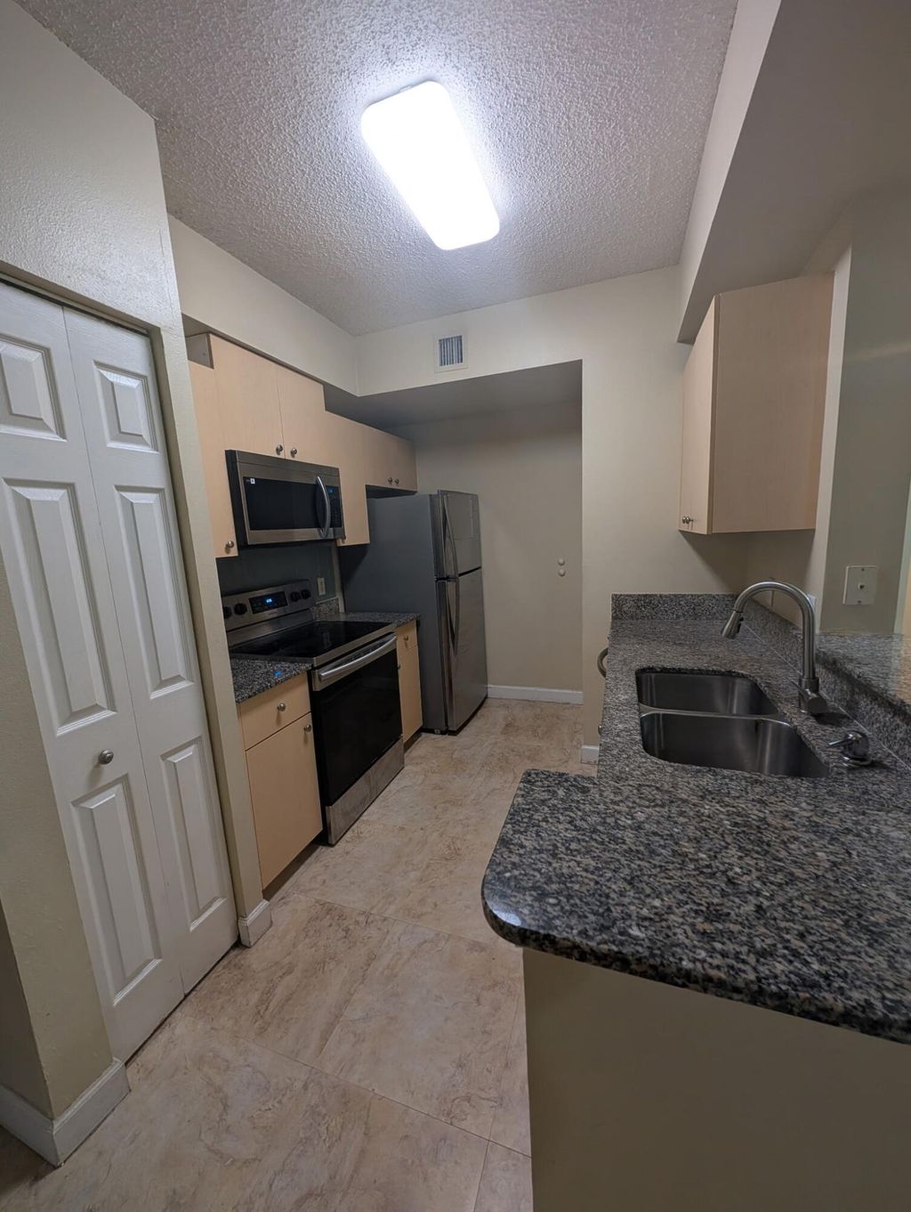 Photo of 2490 Centergate Drive #105, Miramar, FL 33025 (MLS # B26025063)