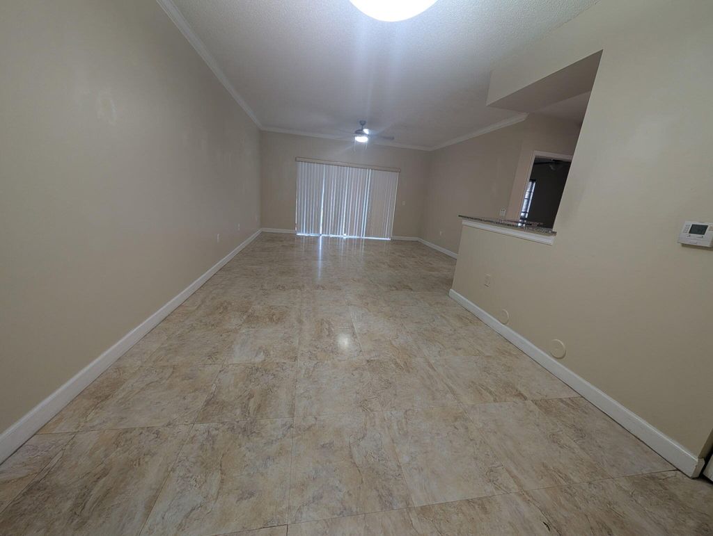 Photo of 2490 Centergate Drive #105, Miramar, FL 33025 (MLS # B26025063)