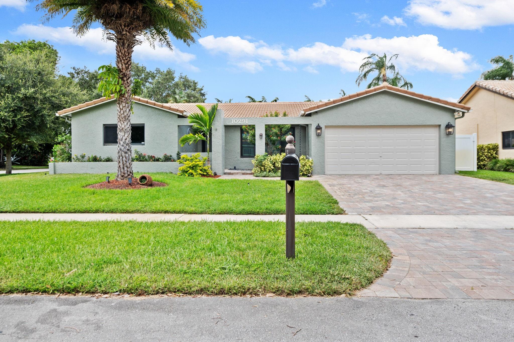 NESTED ON A DESIRABLE CORNER LOT, THIS IMMACULATE 3 BED, 2 BATH SINGLE FAM RESIDENCE OFFERS AN OPEN FLOOR PLAN OF COMFORT, FUNCTIONALITY & FREEDOM W/NO HOA! 2,036 SF UNDER AIR + 2-CAR GAR (2,387 SF) PAINTED IN/OUT (3/25) W/NEW FLAT ROOF COMING SOON. ENJOY PEACE OF MIND W/HIGH IMPACT WINDOWS, DOORS (2016) & GAR DOOR (2005). NEW SCREENED PATIO W/ACCORDION SHUTTERS, NEW ELEC PANEL (2022) & WTR HTR (2024). ELEGANT REMODELED BATHS, SPACIOUS DINING & LIVING RMS & UPDATED OPEN KITCHEN W/GRANITE COUNTERS & SS APPLIANCES. NEW PAVERS ON WALKWAY, PATIO & EXPANDED DRIVEWAY (2022), NEW VINYL FENCE (2021) & SMART SPRINKLERS. JUST .05 MI TO CENTRAL PK ELEM, 0.4 MI TO CENTRAL PK (TENNIS, POOL, CAMPS), 1.6 MI TO PUBLIX, 1.5 MI TO DINING, BROWARD MALL, REGAL, THE FOUNTAINS, PLANTATION WALK & PRESERVE TRAIL.