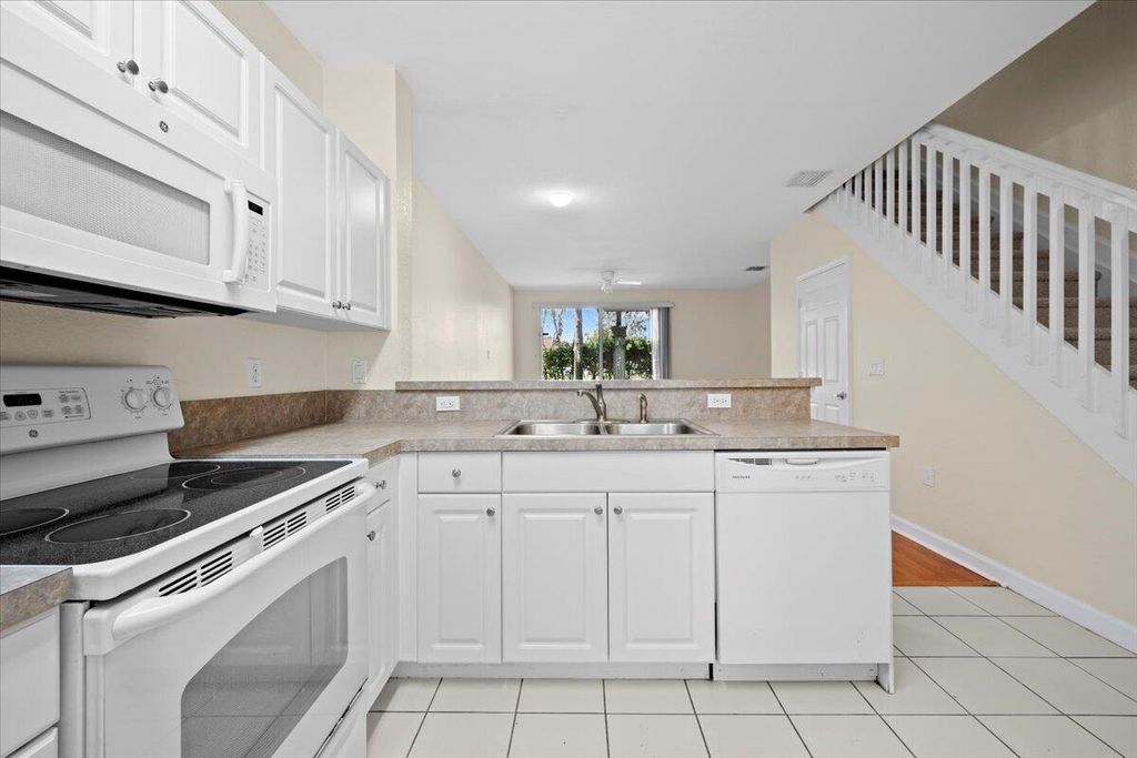 Photo of 4150 Napoli Lake Drive, Riviera Beach, FL 33410 (MLS # R11081833)