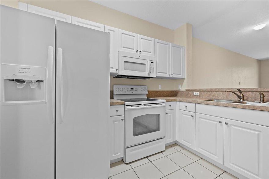 Your Ideal Townhome Awaits! Priced for a Quick Sale with Incredible Value! Imagine coming home to this charming 2-bedroom, 2-bathroom townhome conveniently located close to Downtown West Palm Beach and with easy access to I-95. This move-in-ready gem boasts brand new carpeting throughout the upstairs, including both spacious bedrooms, the versatile loft area, and the staircase. Fresh paint throughout the entire unit creates a bright and welcoming atmosphere. Enjoy a remarkably LOW HOA that unlocks a fantastic community lifestyle with access to a Clubhouse, Community Room for gatherings, a well-equipped Fitness Center, and a fun-filled Game Room. Plus, benefit from the convenience of an On-Site Manager, relax by the sparkling Pool, stroll along the Sidewalks, and unwind in the Spa/Hot Tub. The low HOA also INCLUDES essential services like Lawn Care, general Management, access to Recreational Facilities, and even Trash Removal! Don't miss this opportunity to enjoy a comfortable and amenity-rich lifestyle with excellent proximity to urban amenities and major transportation. Schedule your showing today!