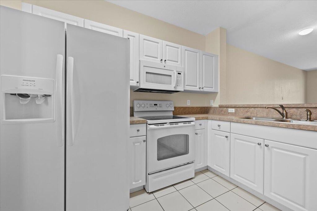 Photo of 4150 Napoli Lake Drive, Riviera Beach, FL 33410 (MLS # R11081833)