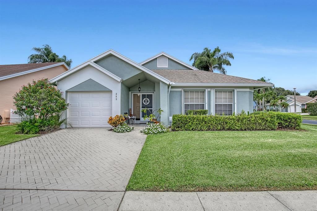 Photo of 263 Moccasin Trail Trl W, Jupiter, FL 33458 (MLS # R10830315)