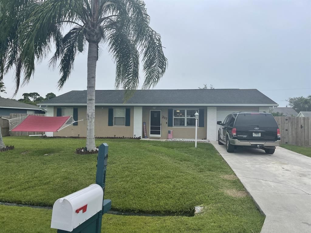 Photo of 217 NE Glentry Avenue Ave, Port Saint Lucie, FL 34983 (MLS # R10806721)