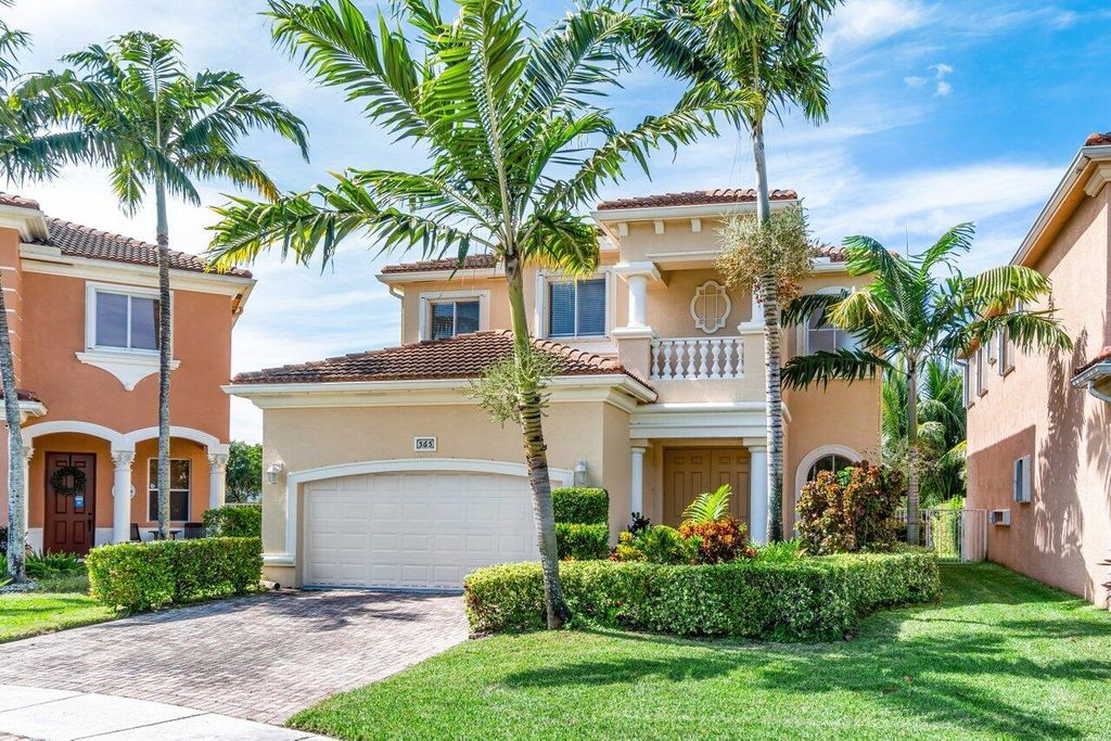Photo of 565 Gazetta Way, West Palm Beach, FL 33413 (MLS # R10929143)