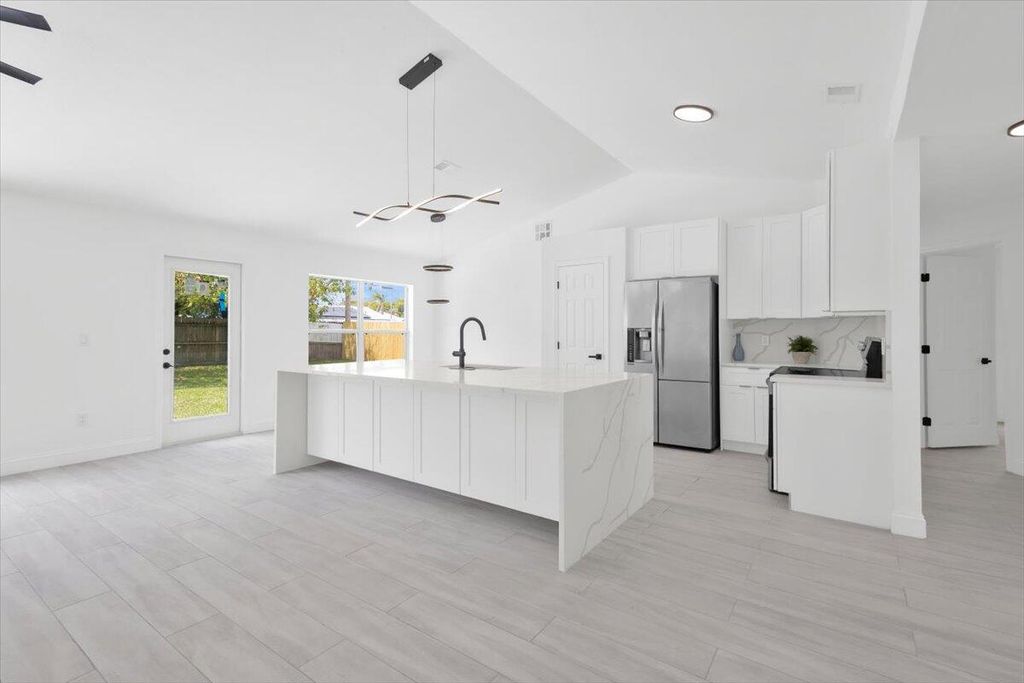 Photo of 3614 SW Viceroy Street, Port Saint Lucie, FL 34953 (MLS # B26009824)