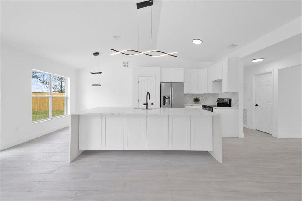 Photo of 3614 SW Viceroy Street, Port Saint Lucie, FL 34953 (MLS # B26009824)