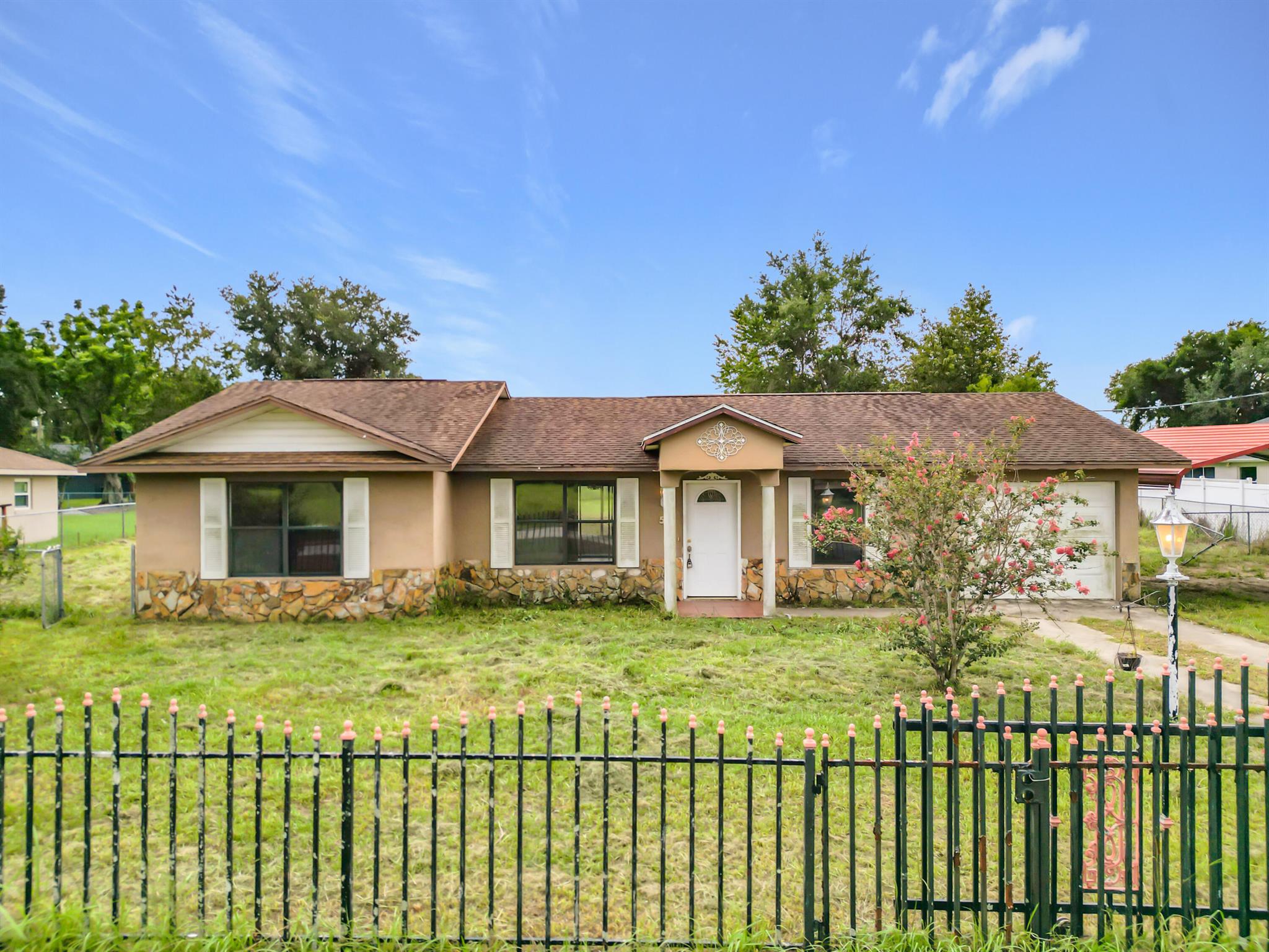 *SELLER FINANCING AVAILABLE* *FINANCIAMIENTO DISPONIBLE* * Move In Special: $23,000 Down and $2,240 monthly* Charming Move-In Ready Home in Silver Springs Shores! Welcome to your dream home at 50 Cedar Road! This stunning 3-bedroom, 2-bath retreat is located in the vibrant Silver Springs Shores community of Ocala, where charm meets modern living. As you step inside, you'll be greeted by an open floor plan that boasts an abundance of natural light, creating a welcoming and uplifting atmosphere. Located just minutes from parks, schools, shopping, and a quick drive to downtown Ocala, this gem is perfect for first-time buyers, those looking to downsize, or savvy investors. Don't let this incredible opportunity slip away--schedule your showing today and prepare to fall in love!