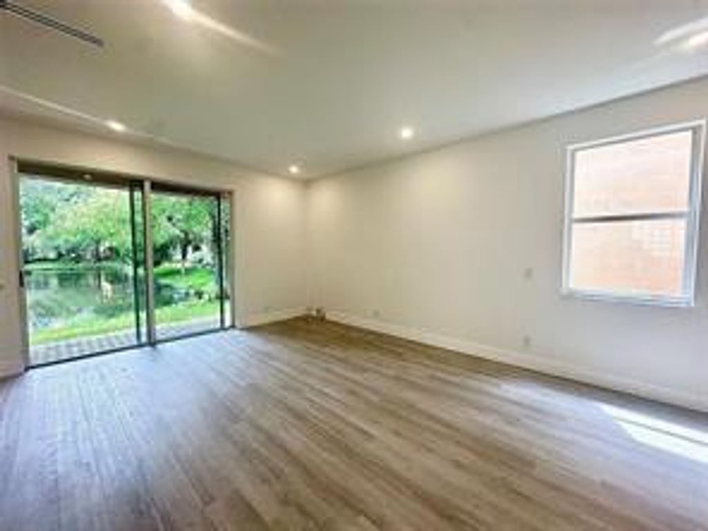 Photo of 10702 NW 1st Court, Plantation, FL 33324 (MLS # B26013553)