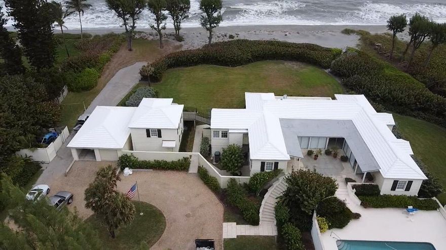 This Property is 1.95 acres with 250' feet of ocean frontage.  Renovate the current house or build your dream house on this large ocean front property.