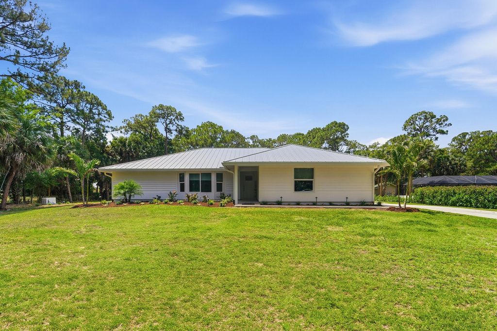 Photo of 9662 Whippoorwill Trail, Jupiter, FL 33478 (MLS # B26028434)