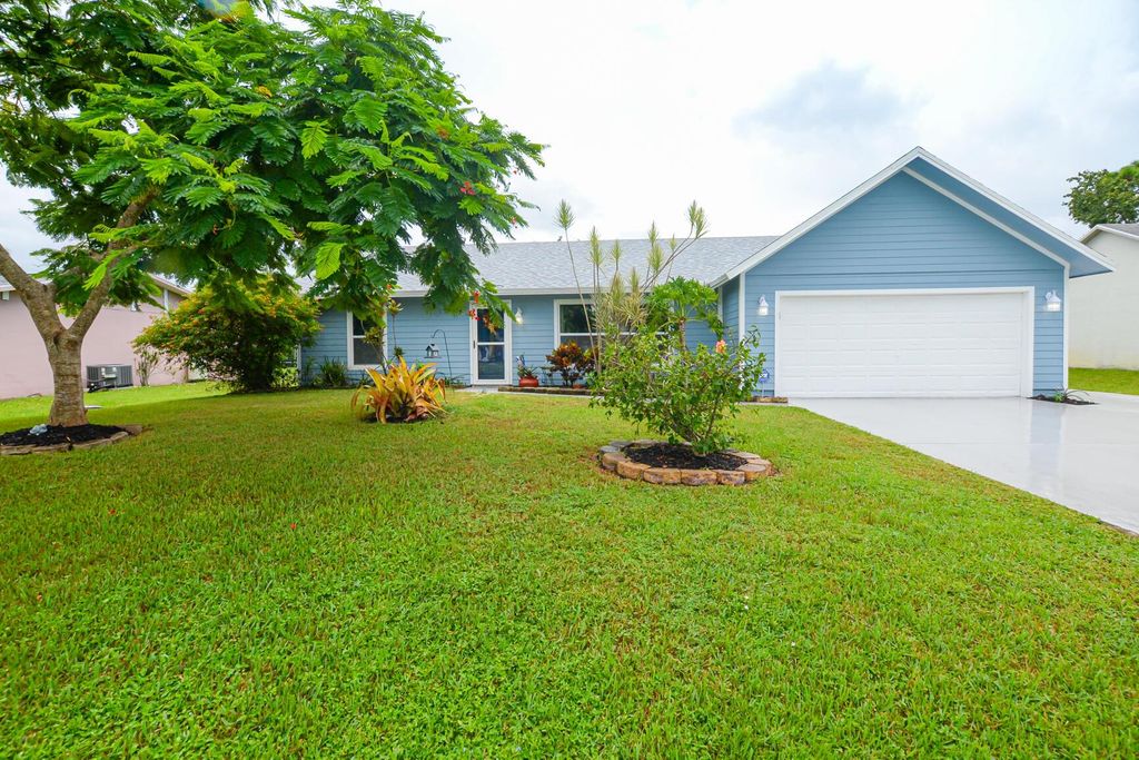 Photo of 314 SE Husted Terrace, Port Saint Lucie, FL 34953 (MLS # R10922605)