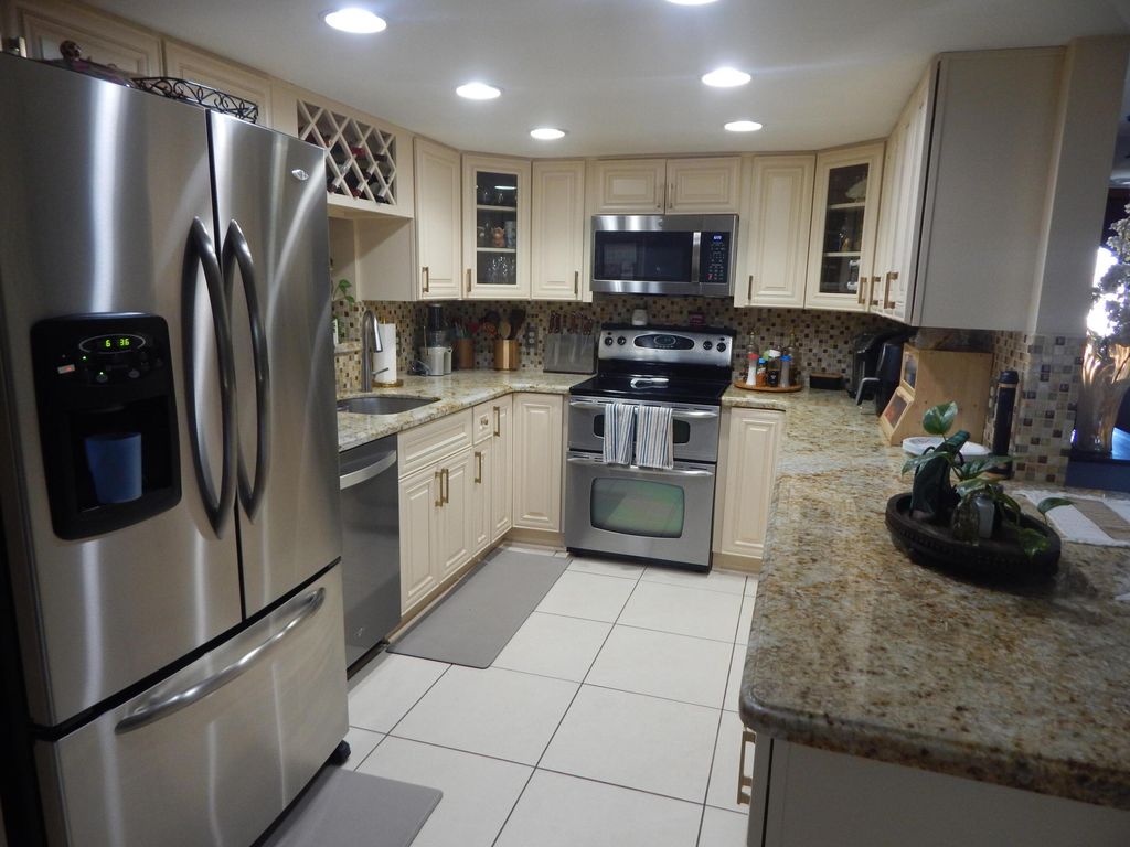 Photo of 121 Granada Street, West Palm Beach, FL 33411 (MLS # R11166796)