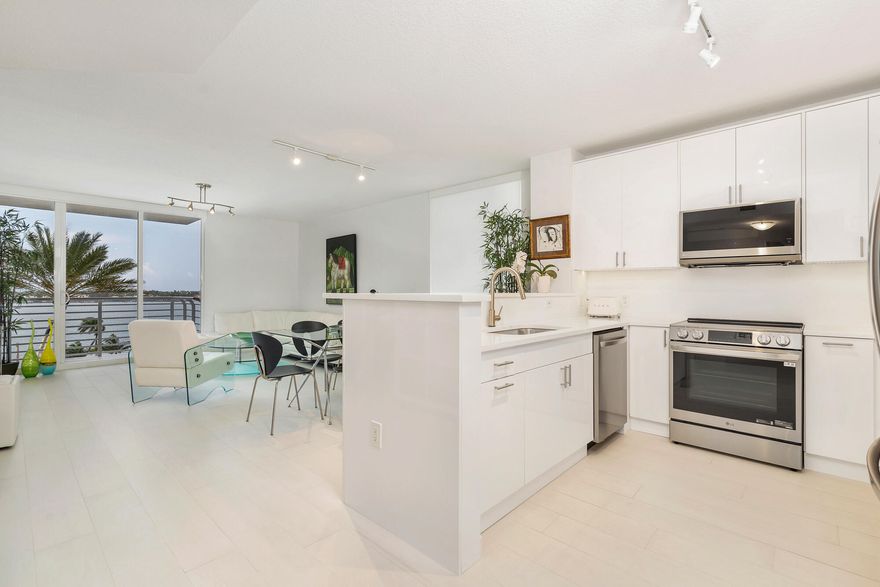 Luxury living in your waterfront condo! This mint recently renovated three bedroom, 2 marble bath home with beautiful direct intercoastal views has everything and is ready to move right in! This condo is perfectly located just South of the new Ritz-Carlton Residences and a half mile from the North Bridge that connects you to Palm Beach. The new and exciting Nora District in West Palm Beach is only .7 miles away!  Perfect residence, Perfect location!!!