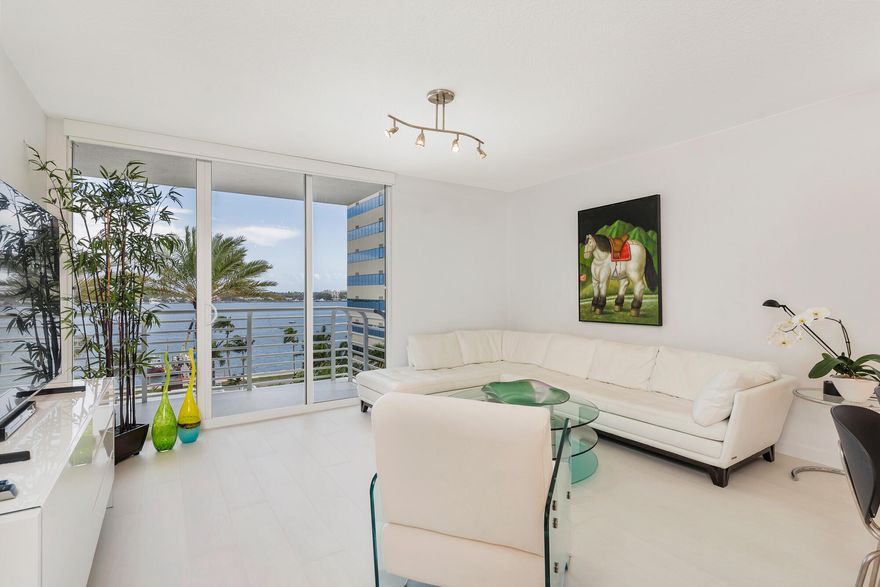 Luxury living in your waterfront condo! This mint recently renovated three bedroom, 2 marble bath home with beautiful direct intercoastal views has everything and is ready to move right in! This condo is perfectly located just South of the new Ritz-Carlton Residences and a half mile from the North Bridge that connects you to Palm Beach. The new and exciting Nora District in West Palm Beach is only .7 miles away!  Perfect residence, Perfect location!!!