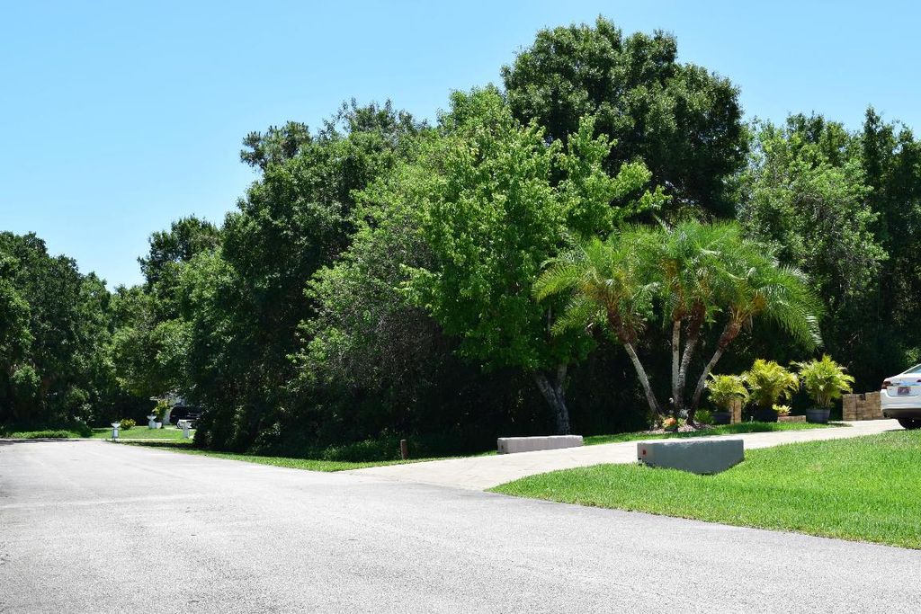 Photo of 8675 Pine Martin Lane, Fort Pierce, FL 34947 (MLS # R10994817)