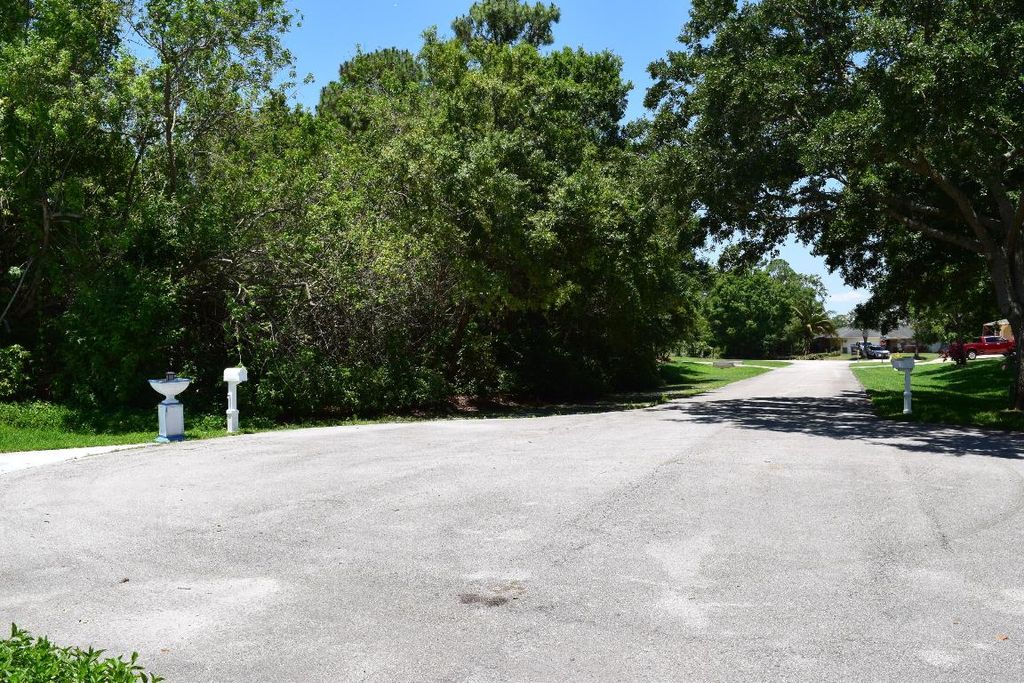Photo of 8675 Pine Martin Lane, Fort Pierce, FL 34947 (MLS # R10994817)