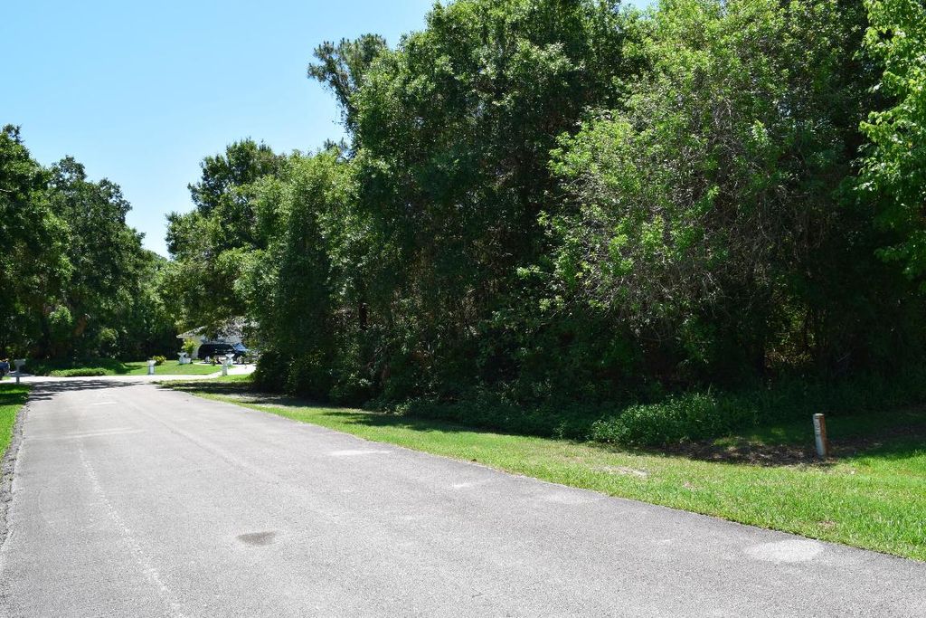 Photo of 8675 Pine Martin Lane, Fort Pierce, FL 34947 (MLS # R10994817)
