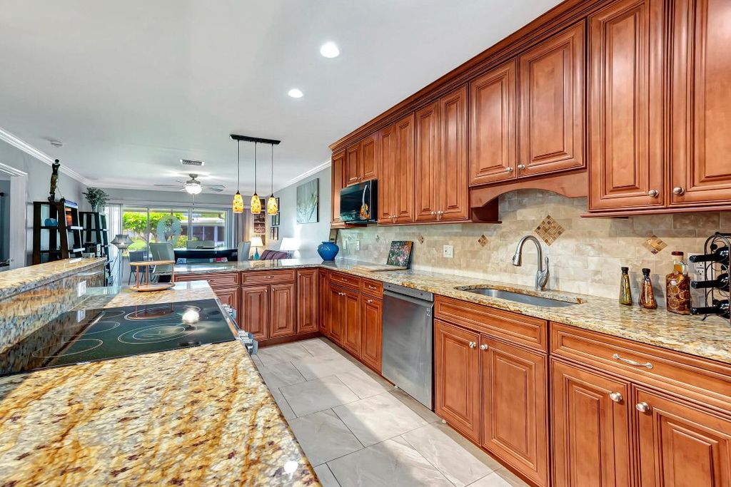 Photo of 1040 N Palm Lane #C, Delray Beach, FL 33445 (MLS # R10968760)