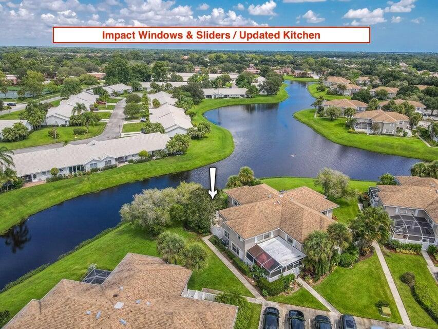 One of the best values in Sunset Trace! Move in ready and updated lakefront Stamford model in the highly sought after community of Sunset Trace in the heart of Palm City. All windows and sliders are IMPACT GLASS and they also have accordion shutters for extra protection. The Townhouse is solid CBS constructions for total peace of mind. This home also features an updated kitchen with soft-close cabinets and drawers, quartz counters, and newer appliances. The community is pet friendly allowing up to two pets and features 2 pools, clubhouse, tennis courts, outdoor racquetball court, full sized basketball court, manned security gate, & sidewalks. Mrs see person to appreciate the value. Schedule your private showing today!
